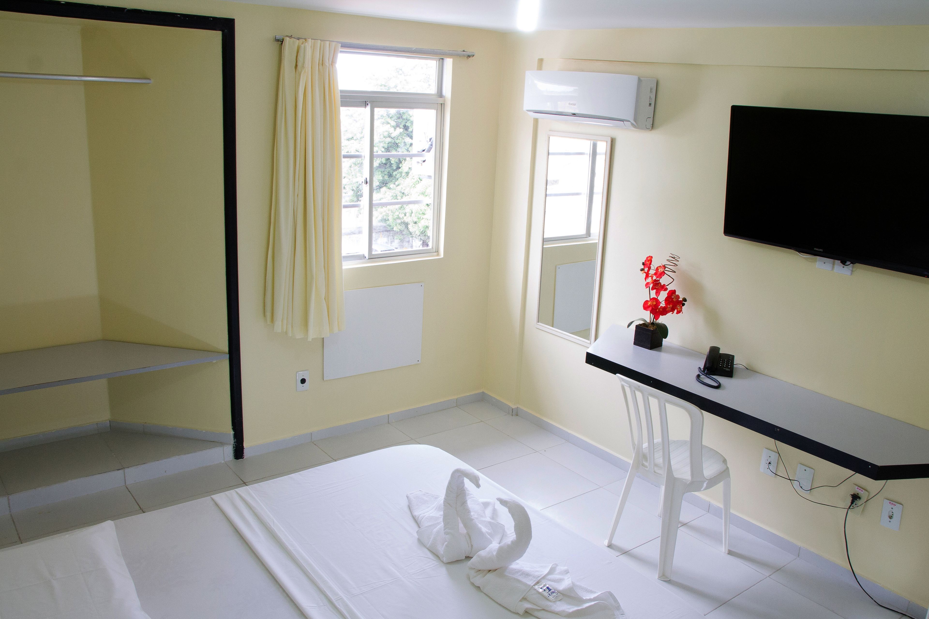 Habitación individual estándar | Caja de seguridad en la habitación y decoración personalizada 