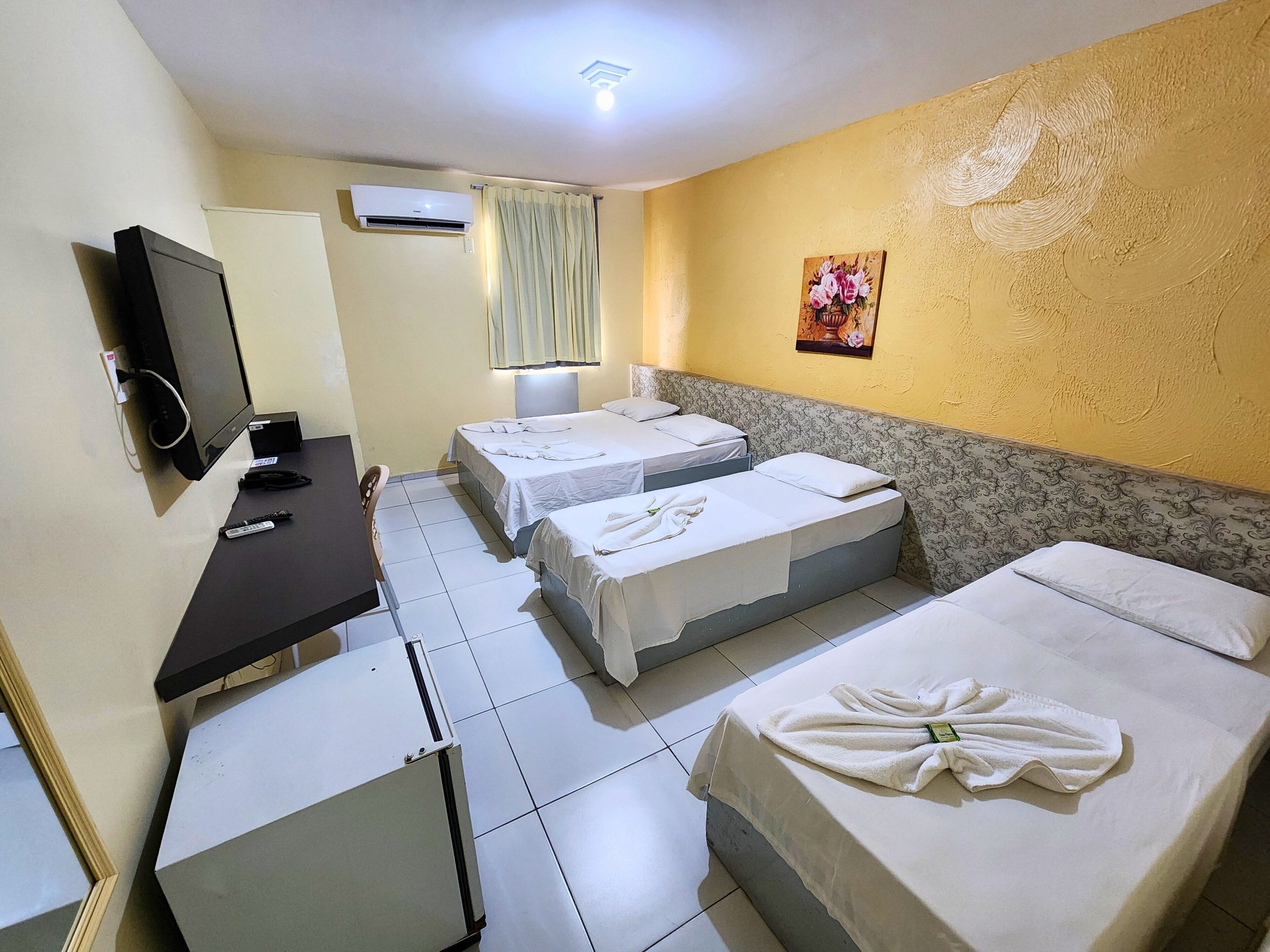 Chambre quadruple familiale, non-fumeur | Coffre-fort, décor unique, accès au Wi-Fi (inclus), literie fournie