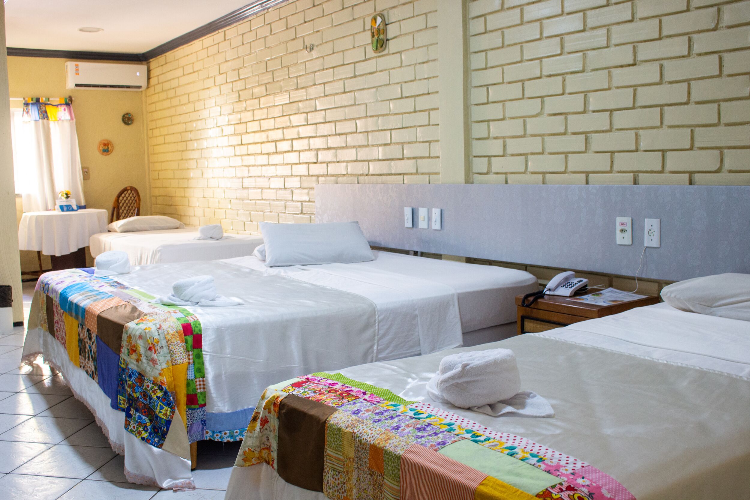 Standard Quadruple Room | In-room safe, iron/ironing board, free WiFi, bed sheets