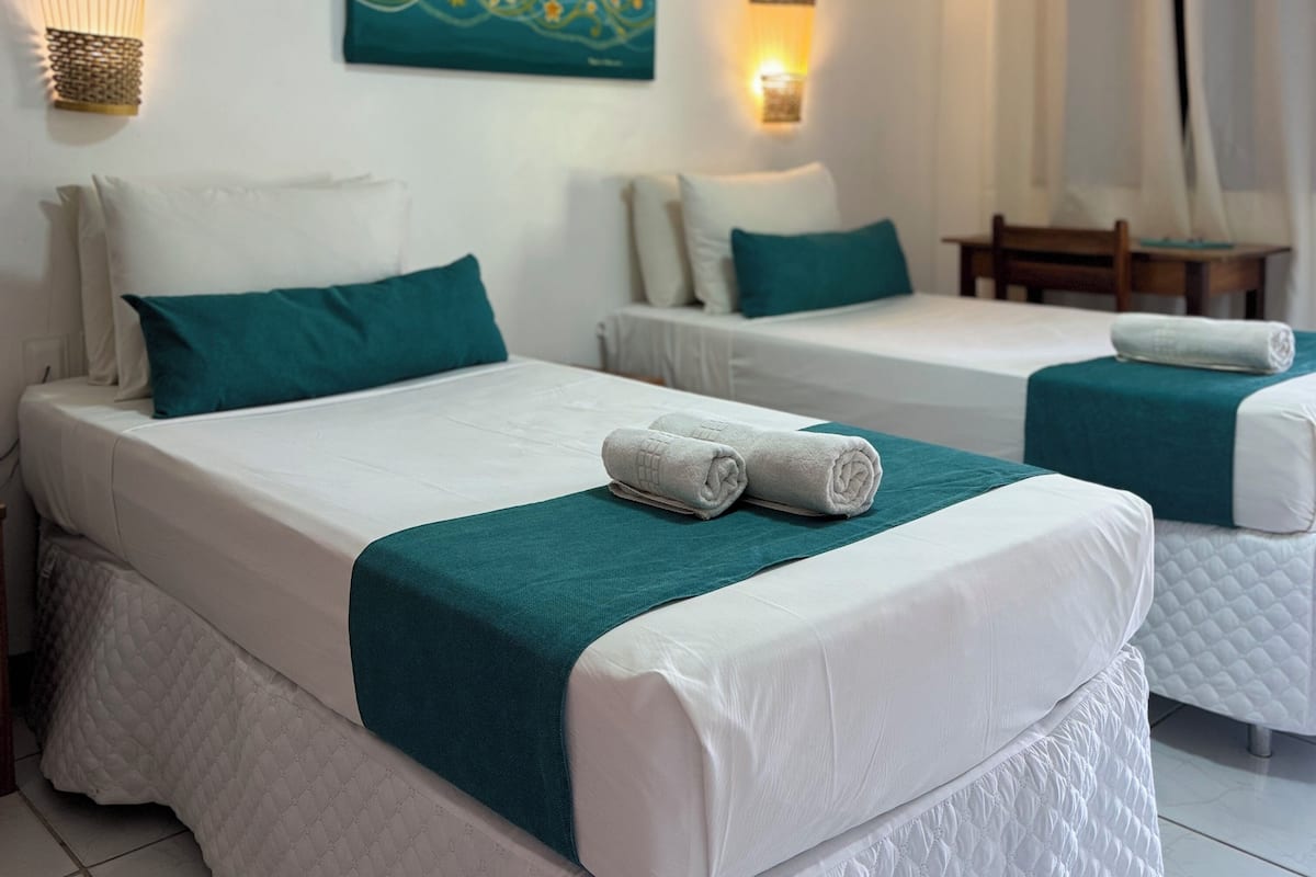 Standaard eenpersoonskamer | 1 slaapkamer, een minibar, een strijkplank/strijkijzer, gratis wifi