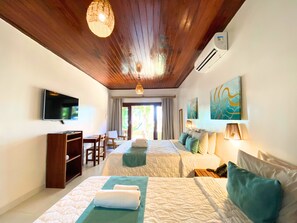 Chambre Triple Supérieure, en front de mer
