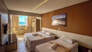 Habitación, vista al mar | Minibar, wifi gratis y ropa de cama