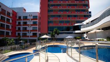 3 outdoor pools, open 10:00 AM to 10:00 PM, pool umbrellas, sun loungers