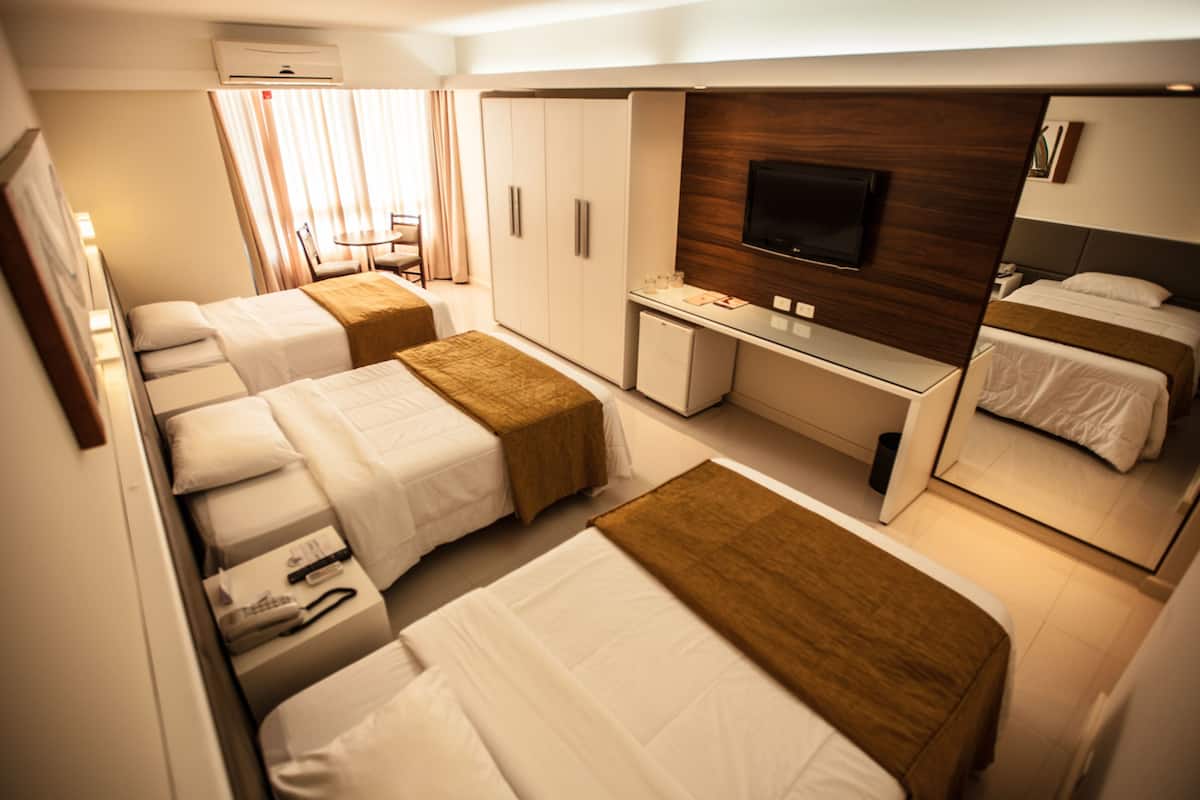 deluxe triple room | 1 bedroom, minibar, in-room safe, individually decorated