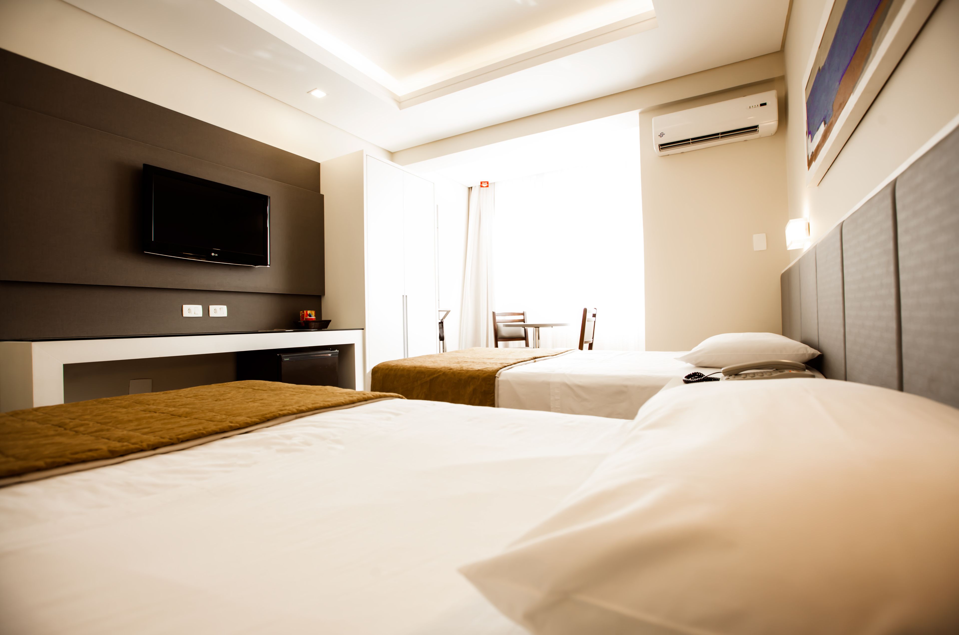 deluxe single room | 1 bedroom, minibar, in-room safe, individually decorated