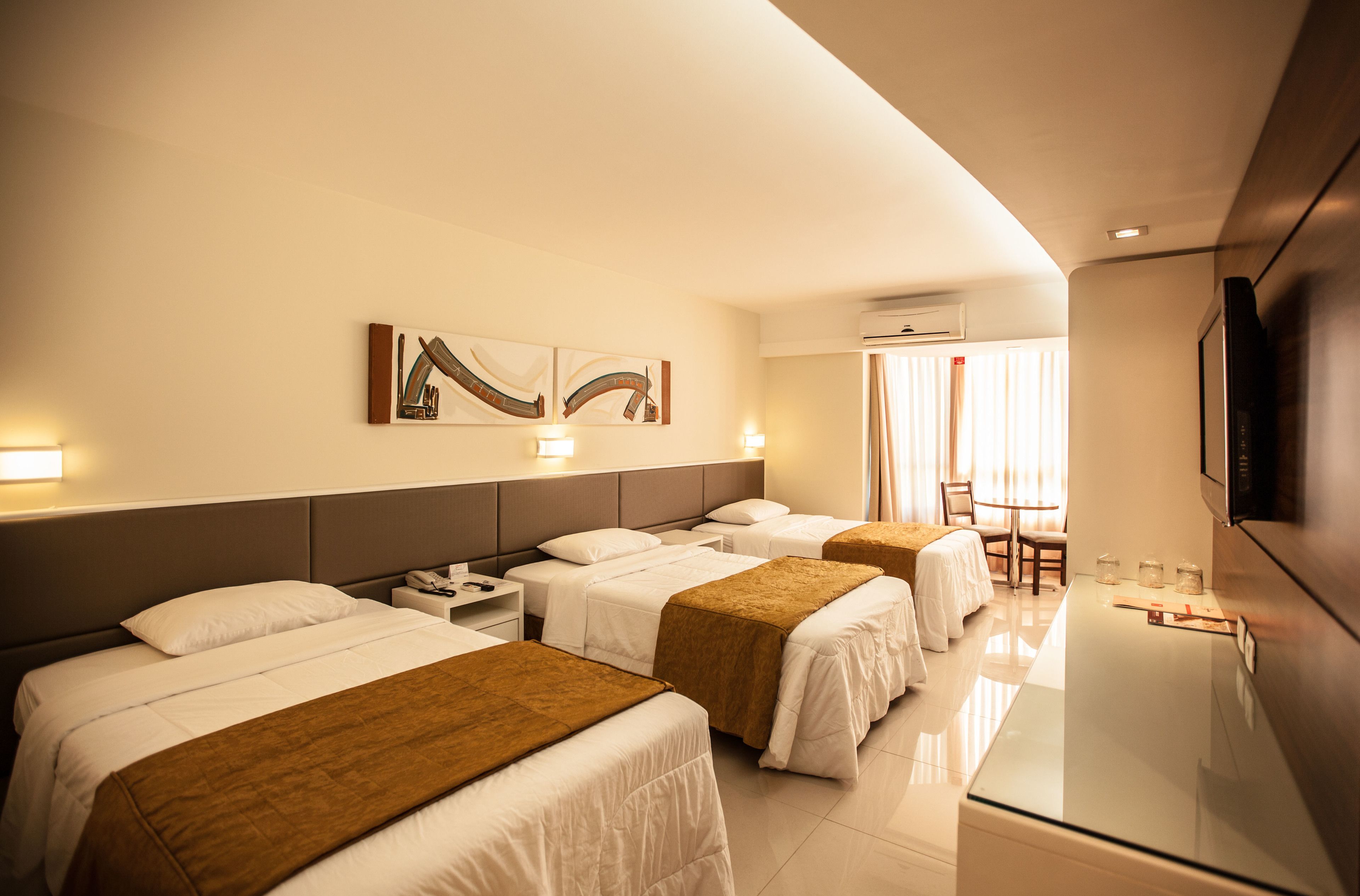 deluxe triple room | 1 bedroom, minibar, in-room safe, individually decorated
