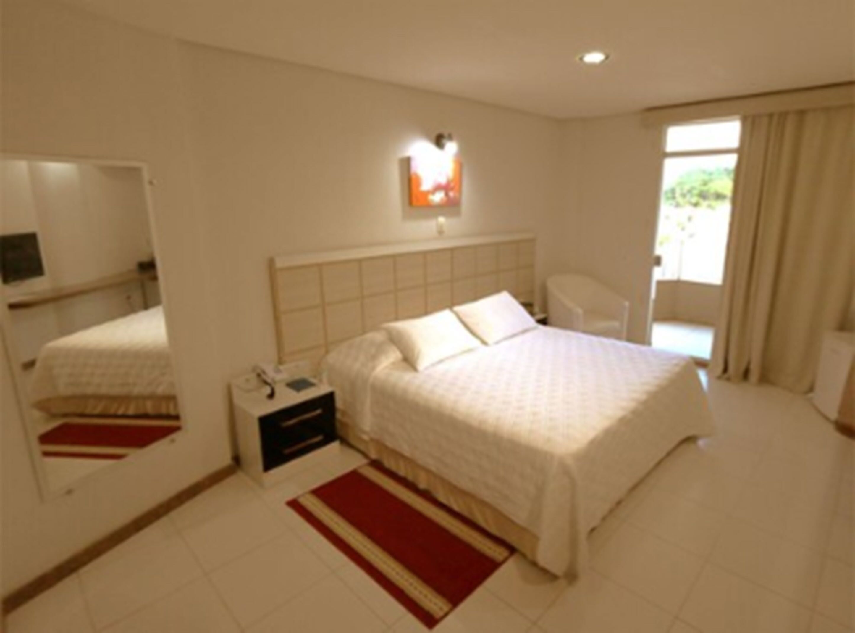 minibar, desk, blackout curtains, iron/ironing board