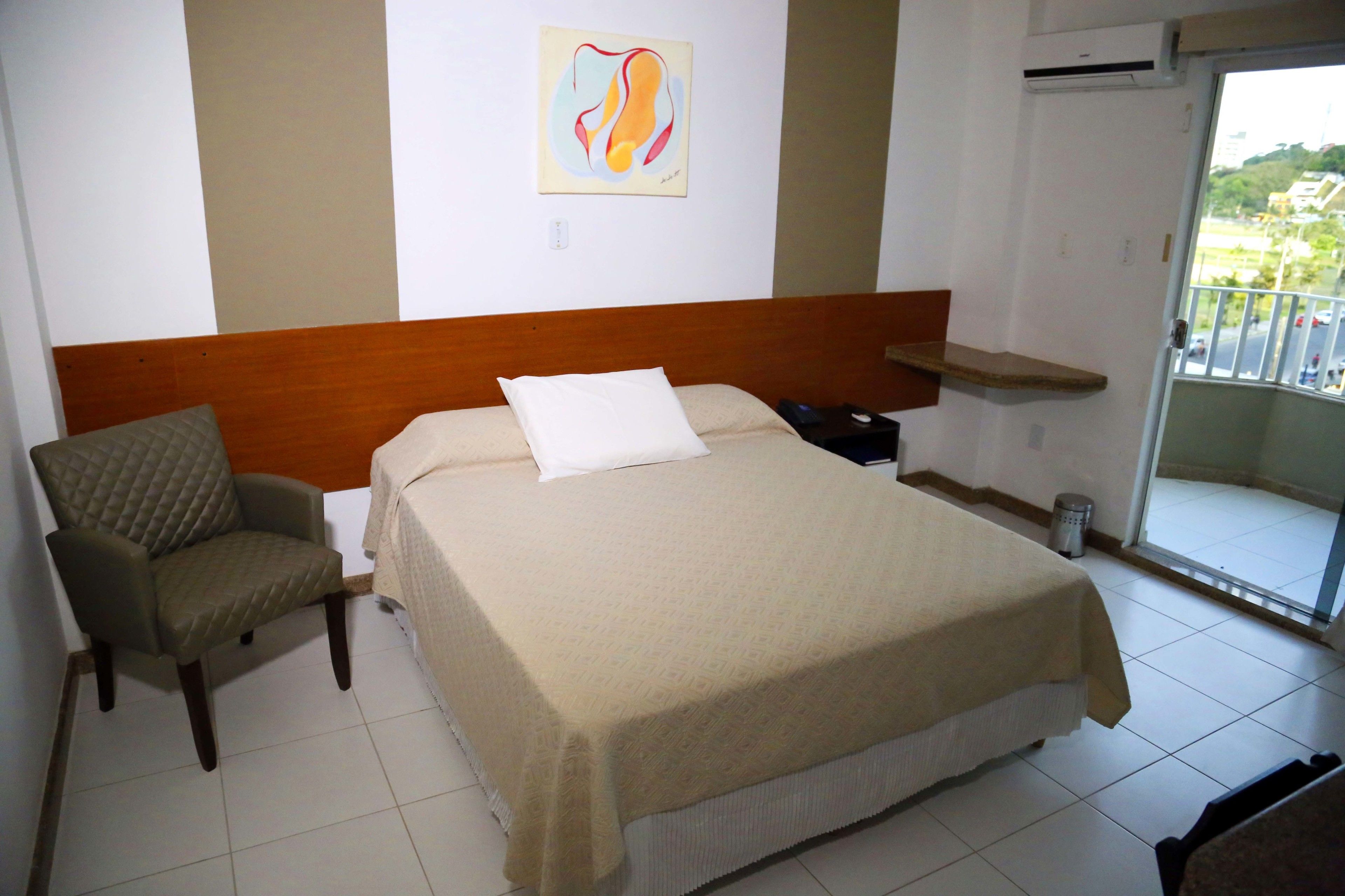 minibar, desk, blackout curtains, iron/ironing board