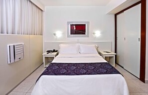 Ropa de cama de alta calidad, minibar, caja fuerte y escritorio