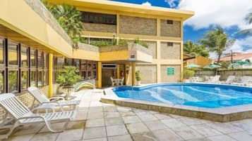 Indoor pool, outdoor pool, pool umbrellas, pool loungers