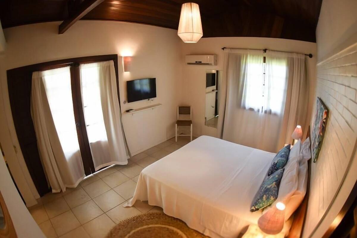 Camas con pillow-top, minibar y caja de seguridad en la habitación