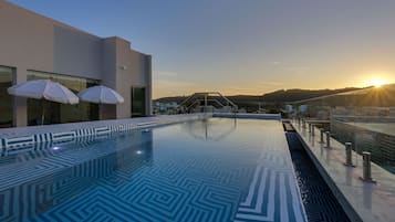 2 outdoor pools, pool umbrellas, sun loungers