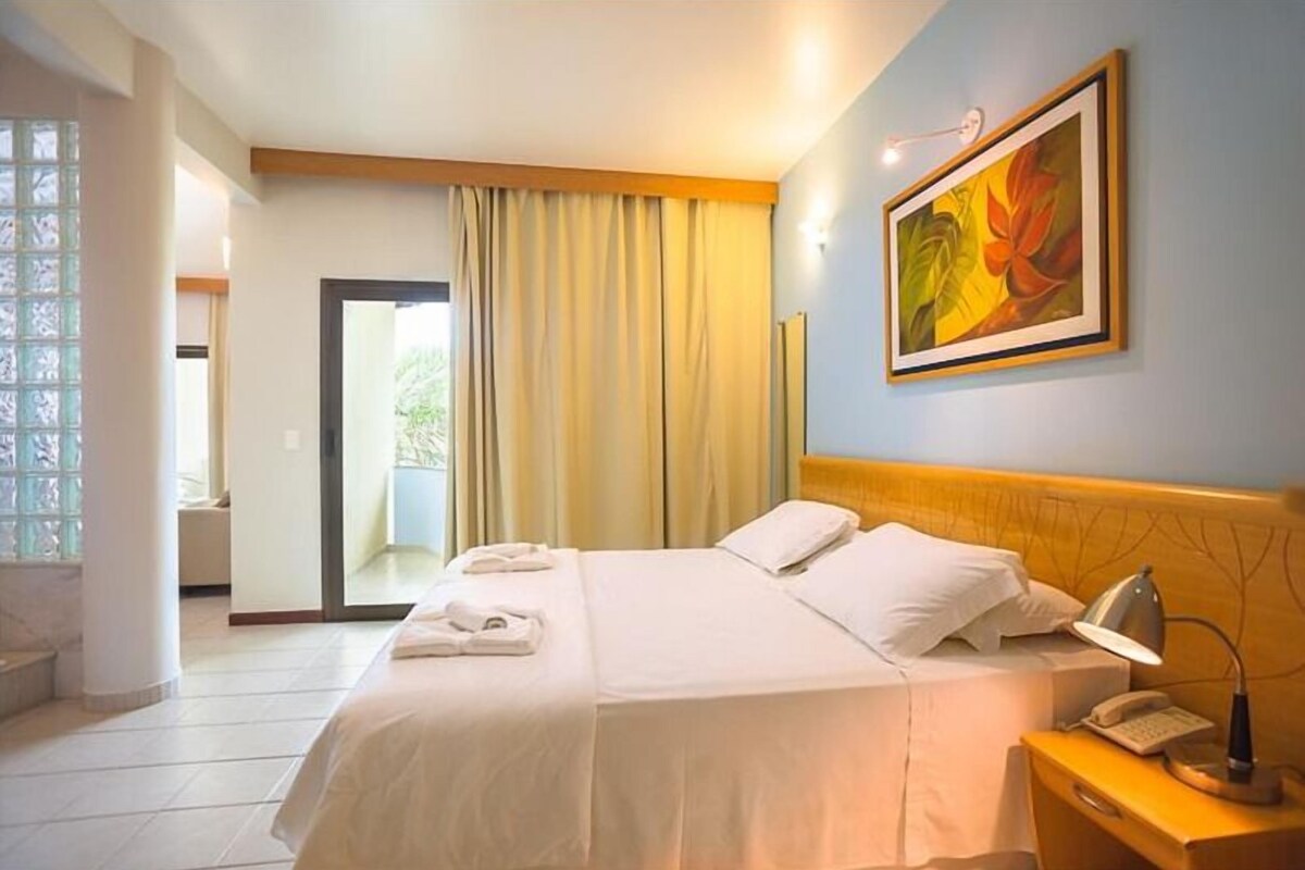 Premium Suite | Minibar, in-room safe, laptop workspace, blackout drapes