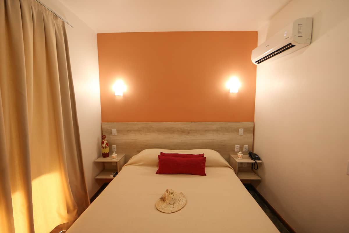 standard room - facing the road | minibar, in-room safe, individually decorated, individually furnished