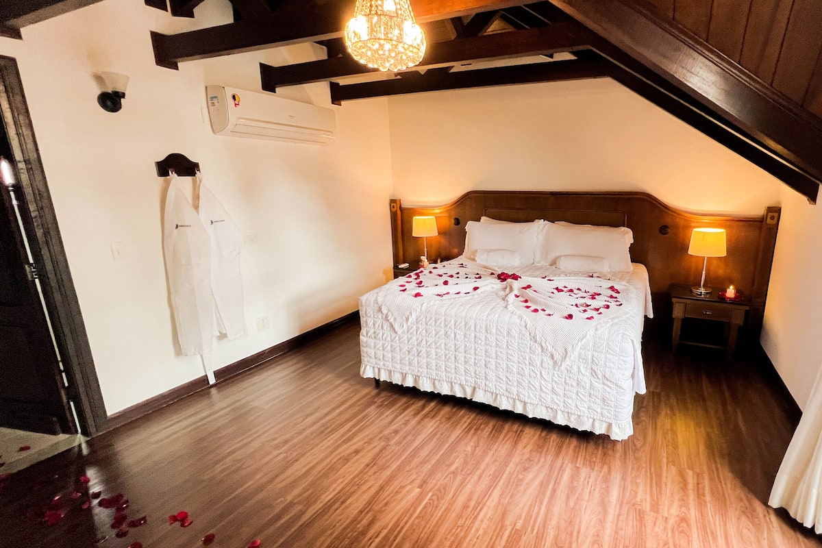 Luxury Suite, 1 Queen Bed | Minibar, in-room safe, individually decorated, individually furnished