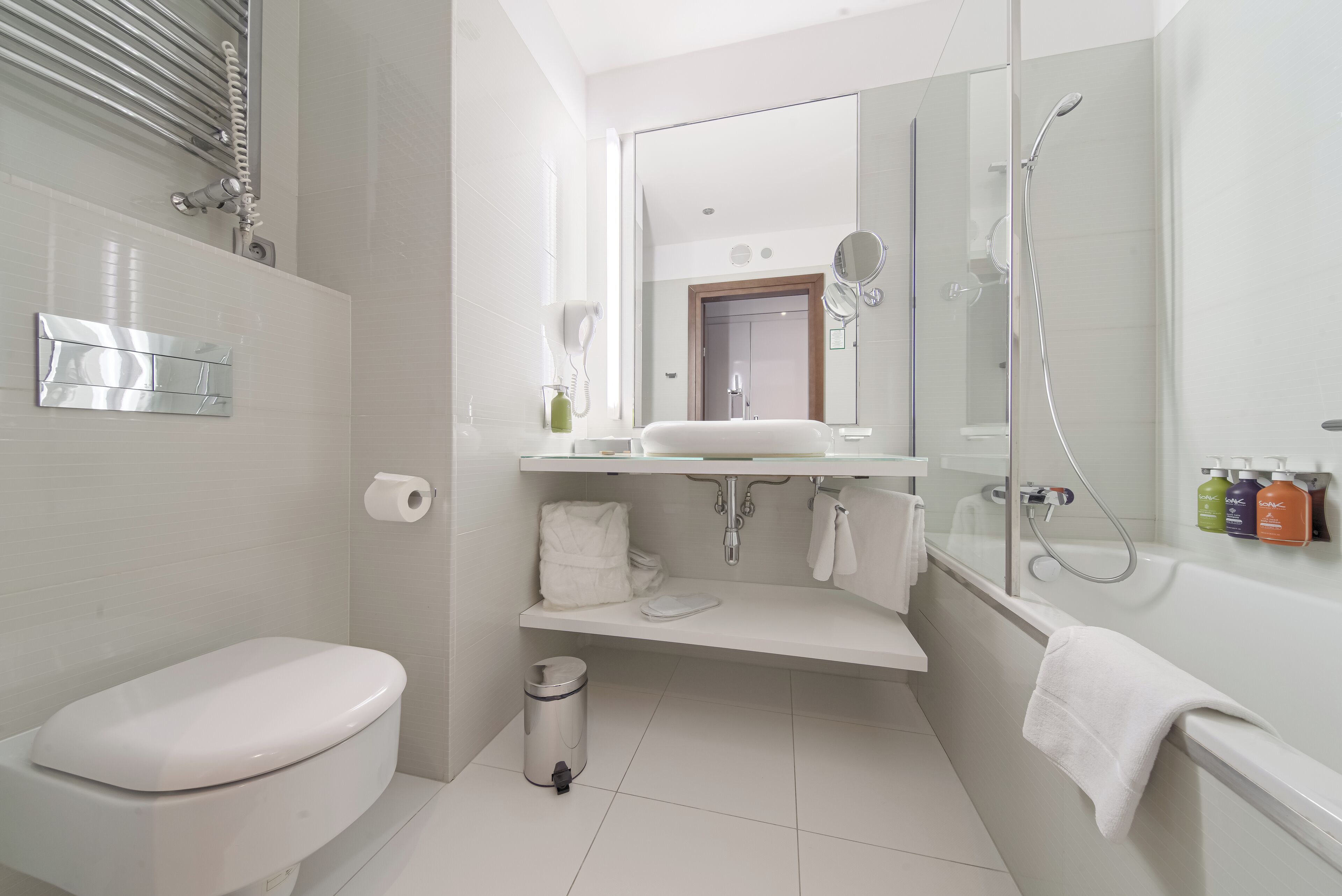 rainfall showerhead, hair dryer, towels, soap