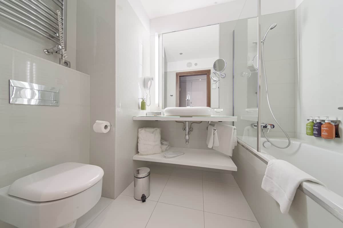 rainfall showerhead, hair dryer, towels, soap