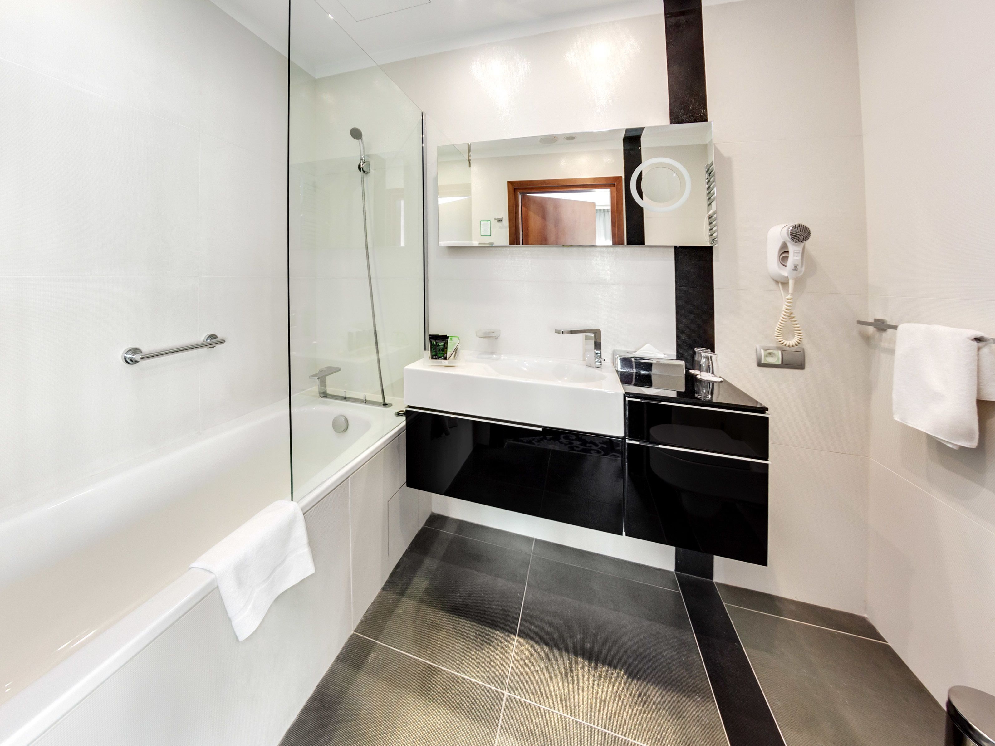 suite, 1 king bed | bathroom | rainfall showerhead, hair dryer, towels, soap