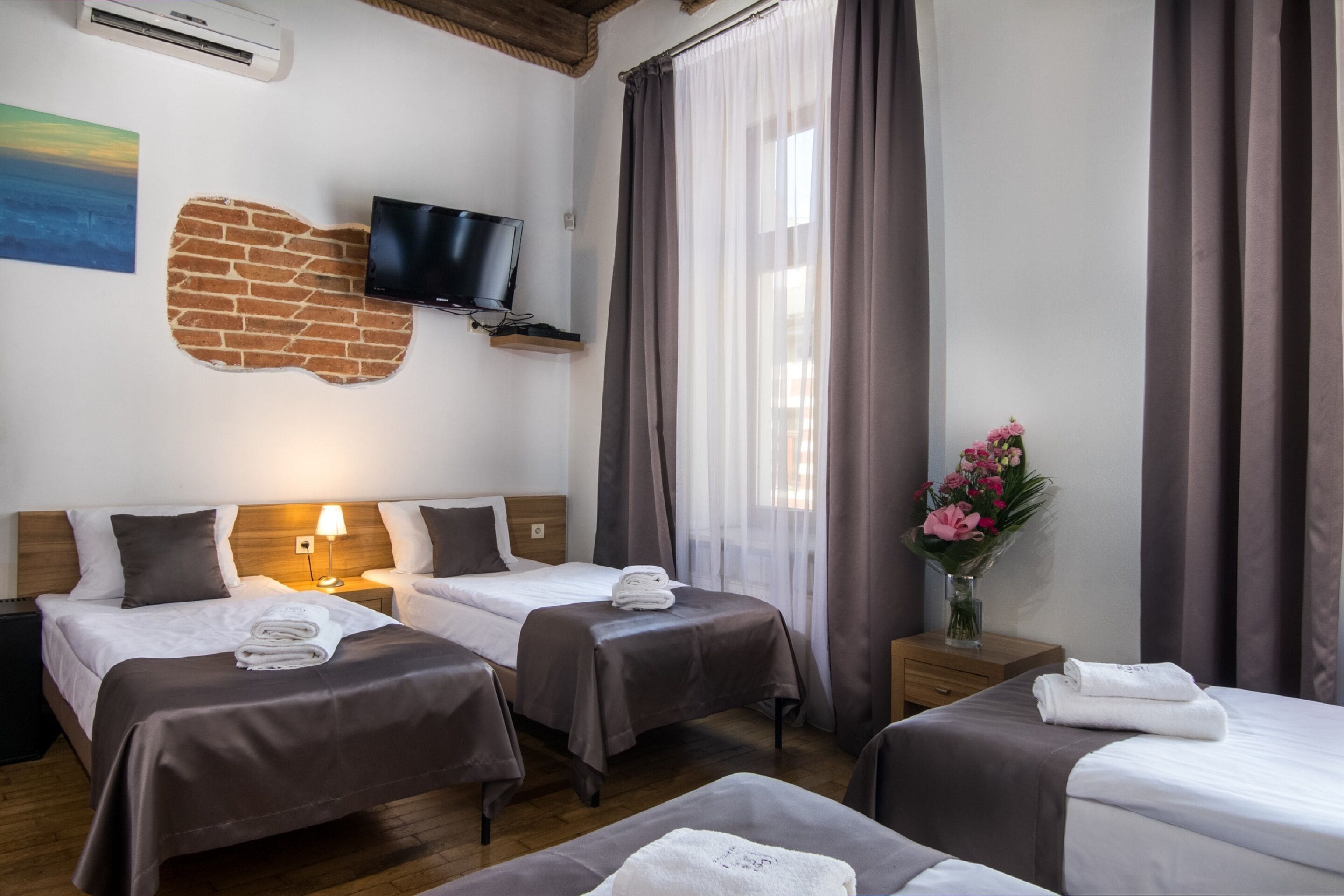 city quadruple room | pillow-top beds, in-room safe, desk, blackout curtains