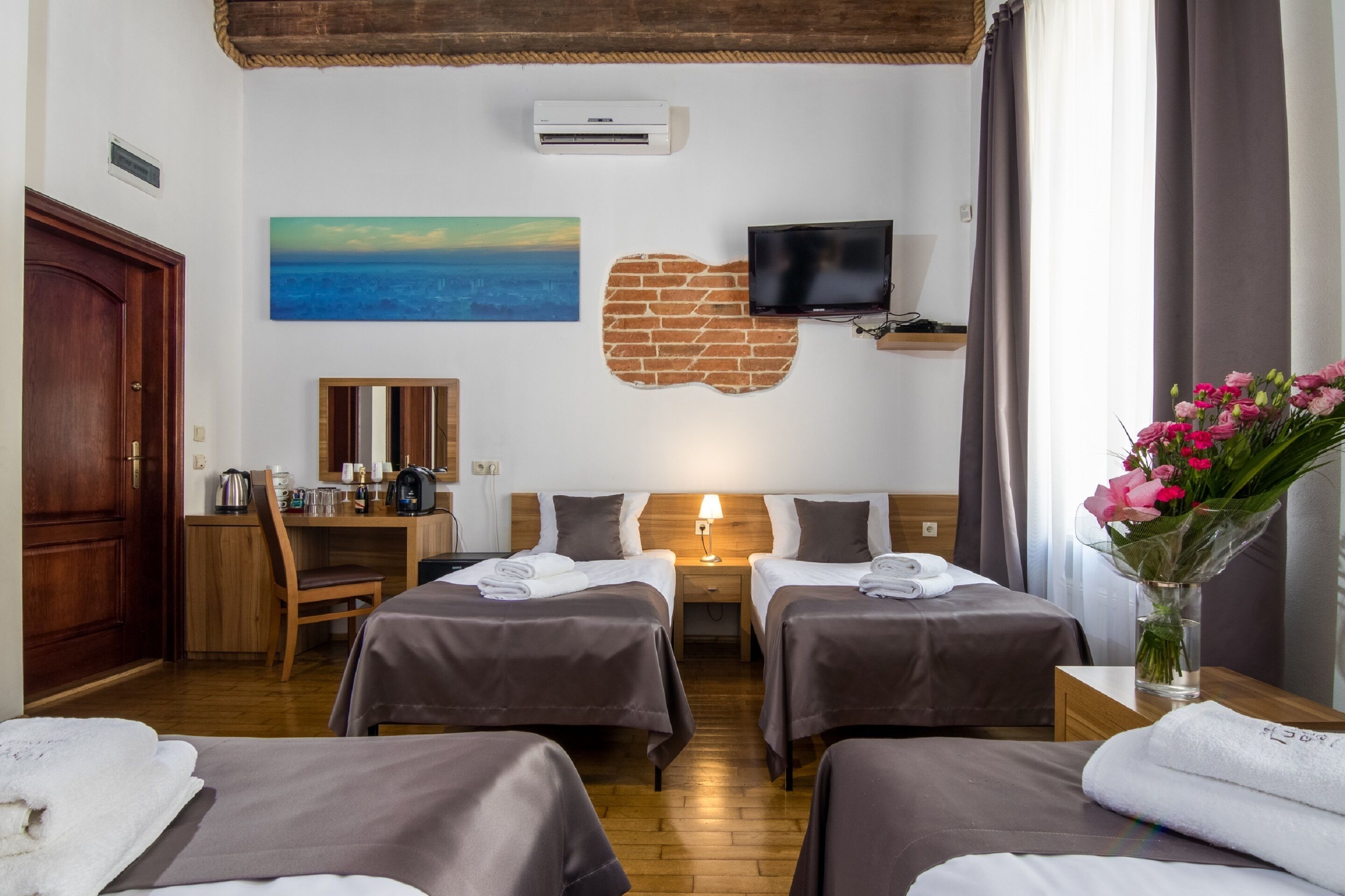 city quadruple room | pillow-top beds, in-room safe, desk, blackout curtains