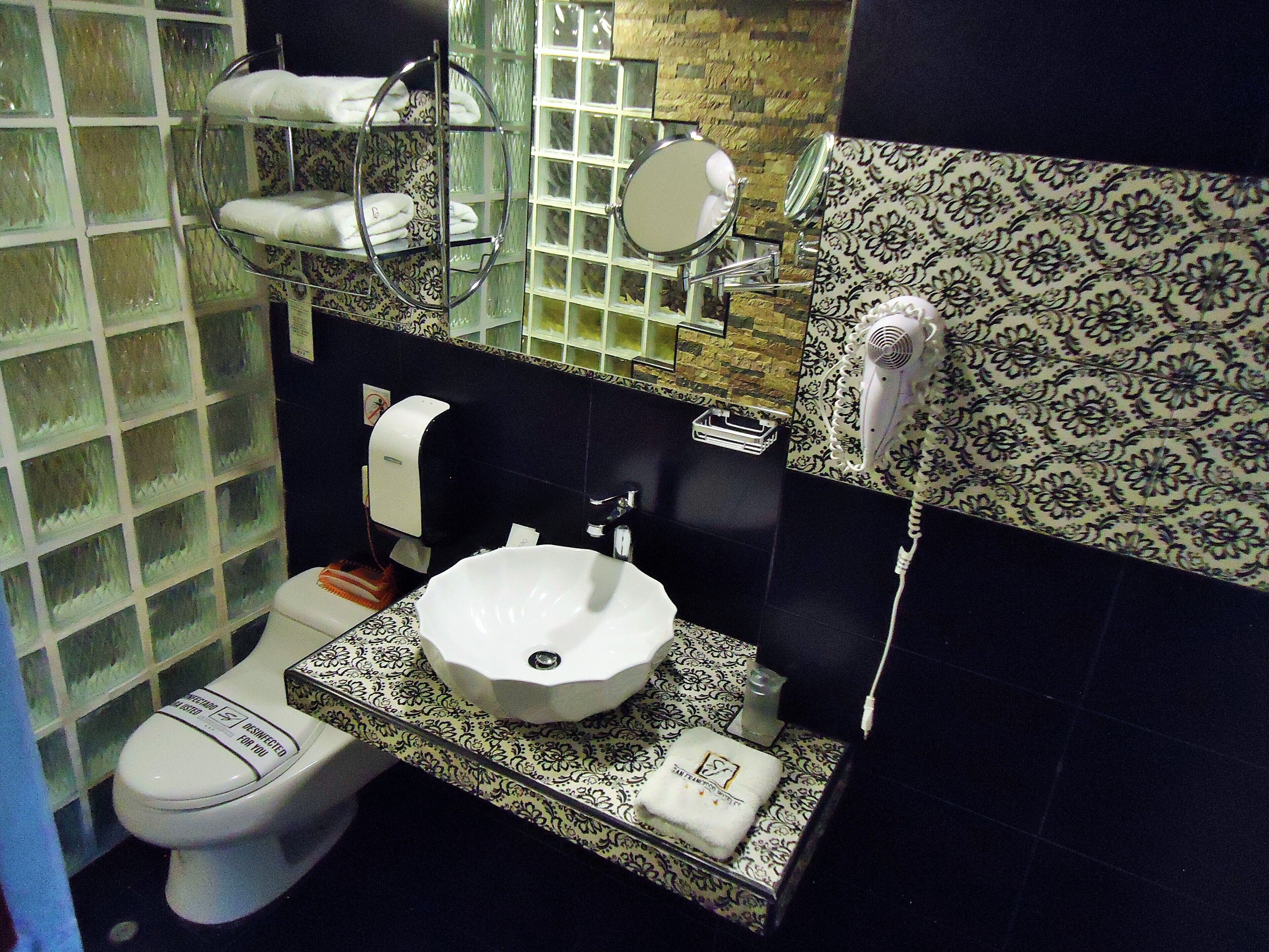 suite | bathroom | free toiletries, hair dryer, slippers, towels