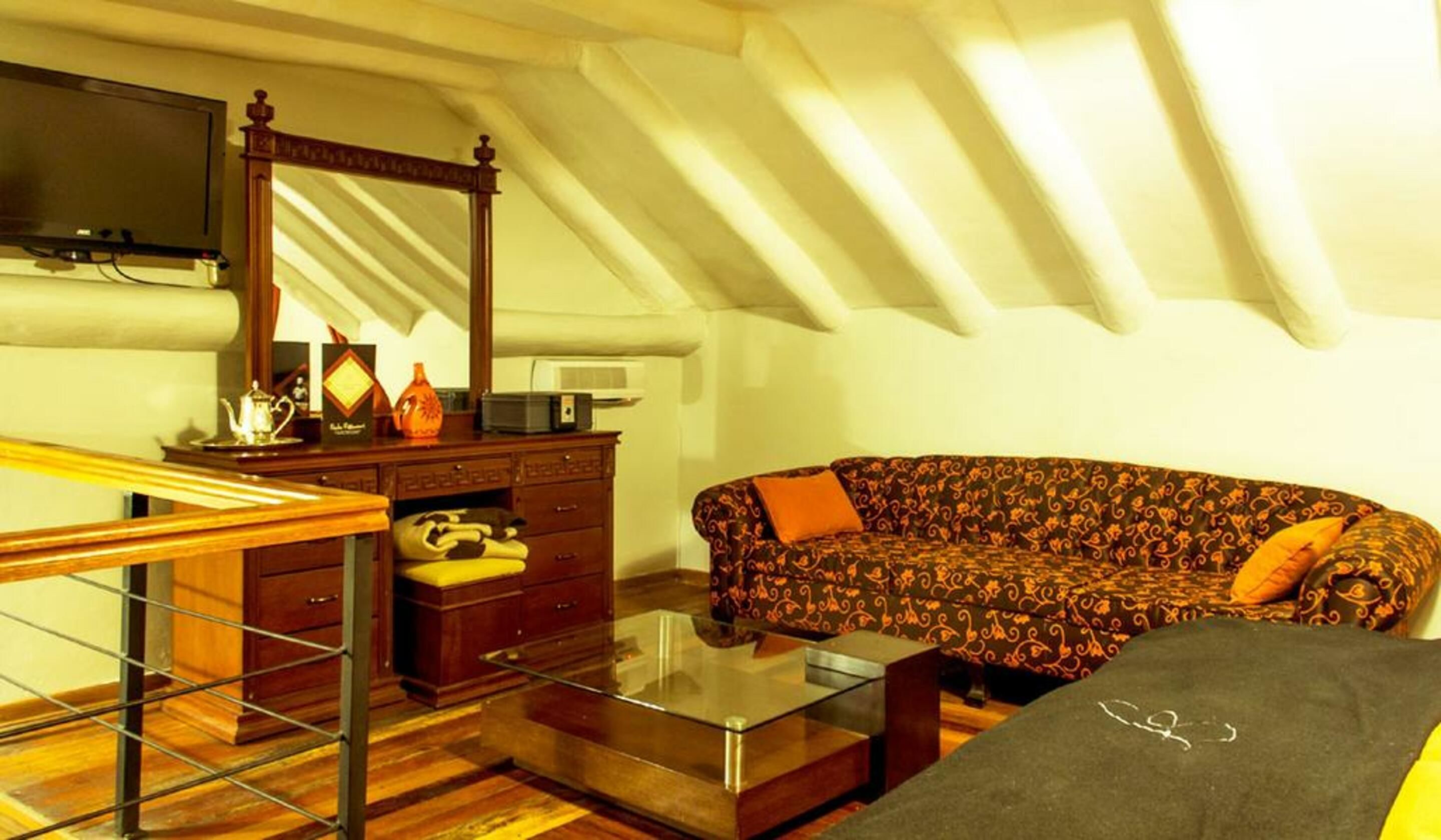 junior suite | in-room safe, desk, soundproofing, iron/ironing board