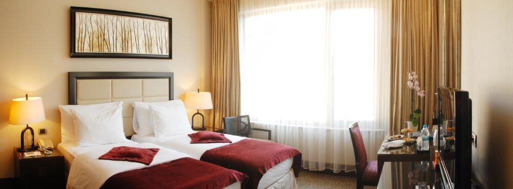 Ropa de cama de alta calidad y minibar 