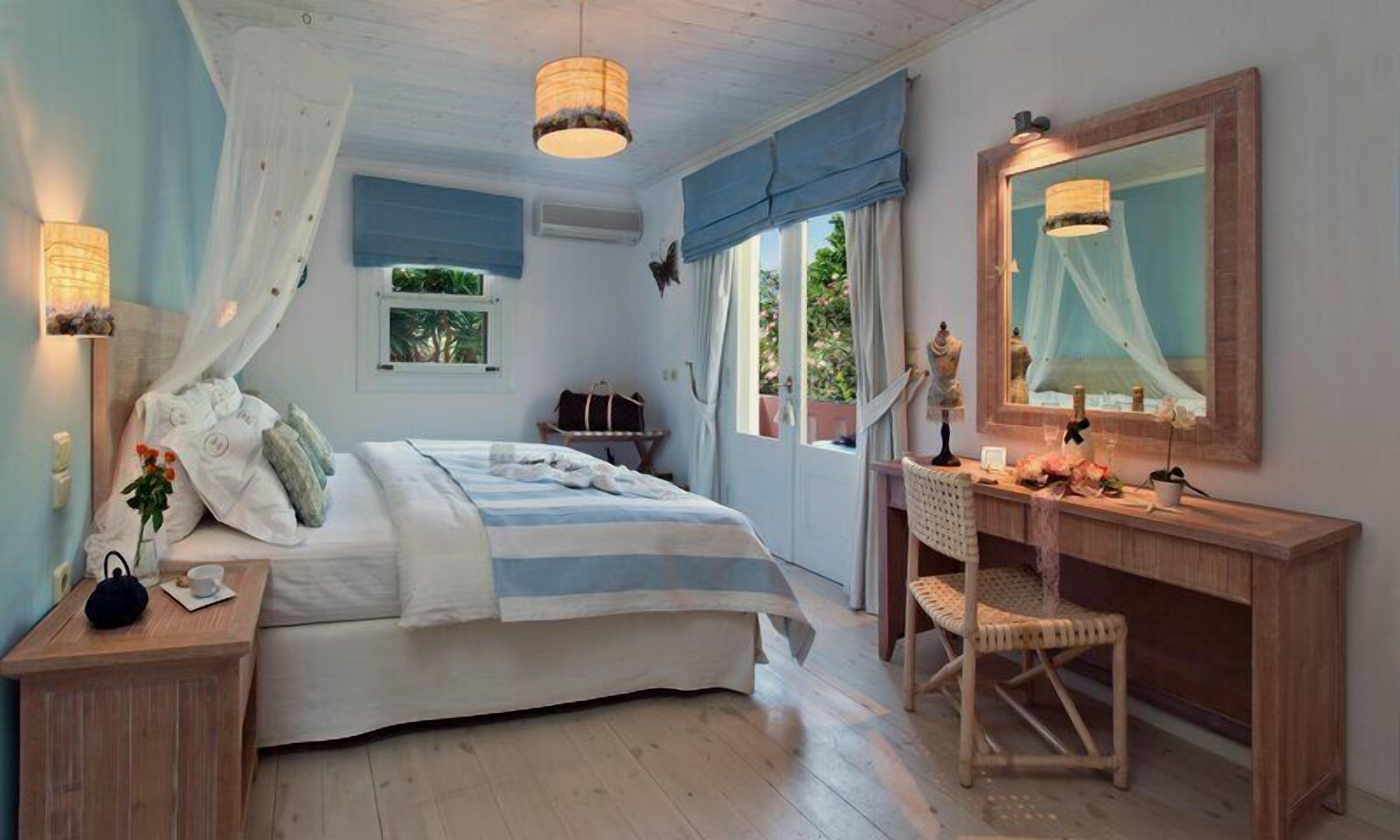 Deluxe Beachfront View Suite | 1 bedroom, Egyptian cotton sheets, premium bedding, down comforters