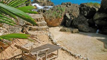 Private beach, white sand, sun loungers, beach towels