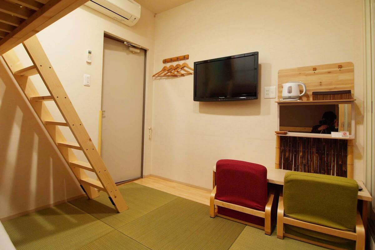 Traditional Twin Room, Private Bathroom | Down comforters, desk, blackout drapes, iron/ironing board (on request)
