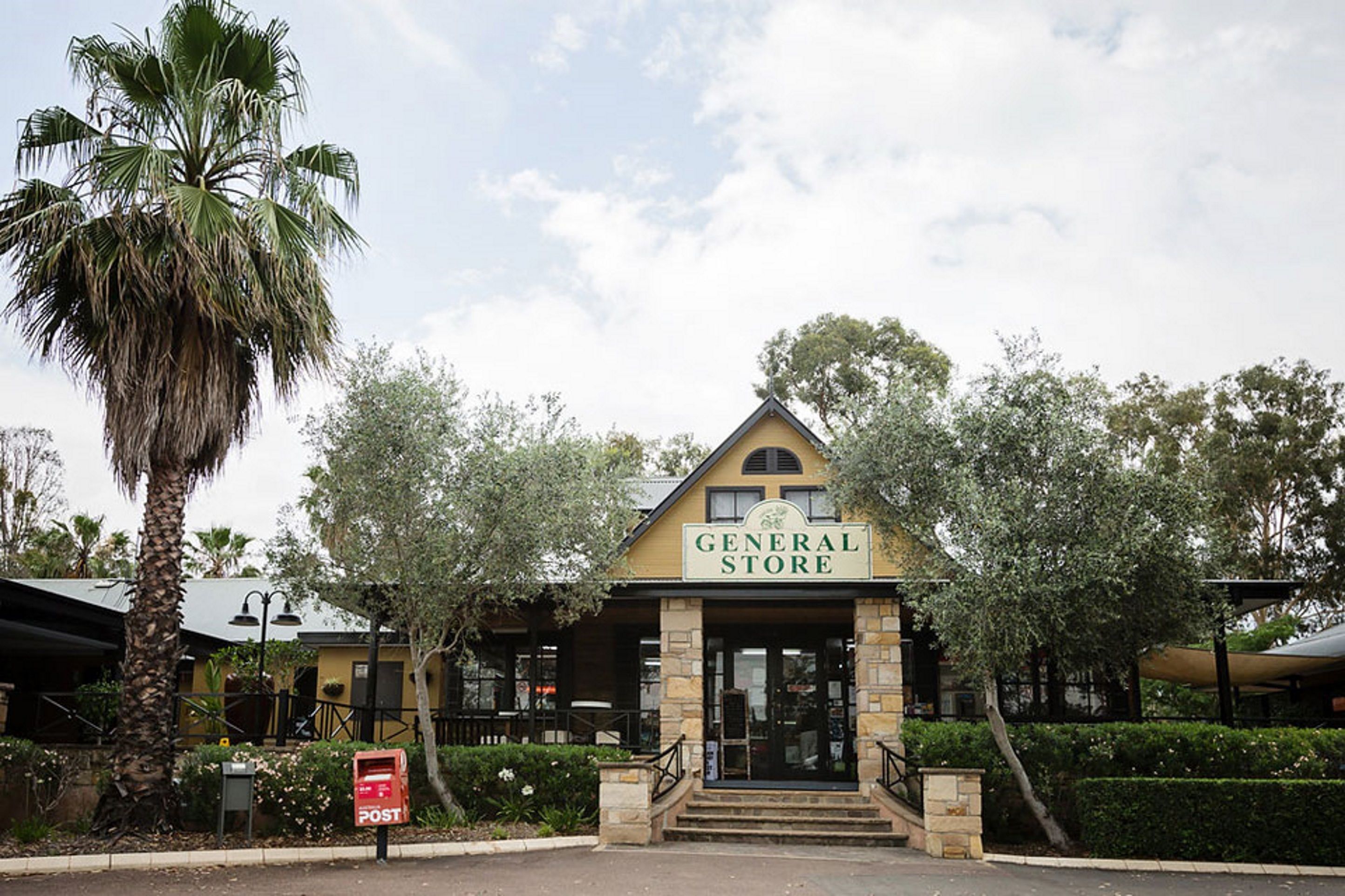 A building with a sign reading "General Store" at the entrance.