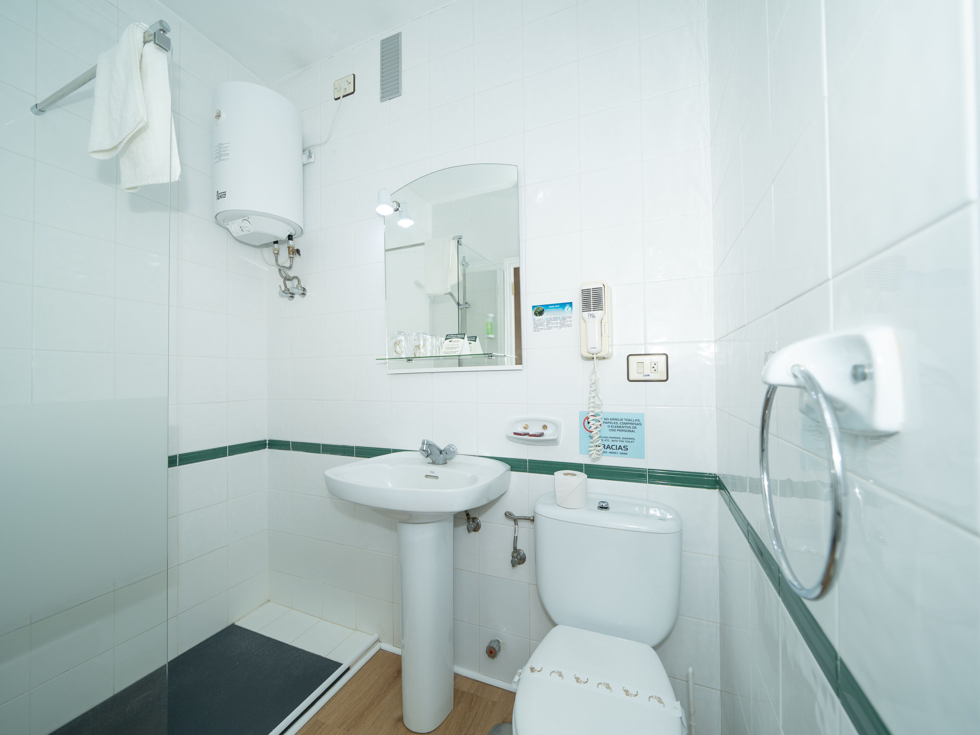 bathtub, free toiletries, hair dryer, slippers