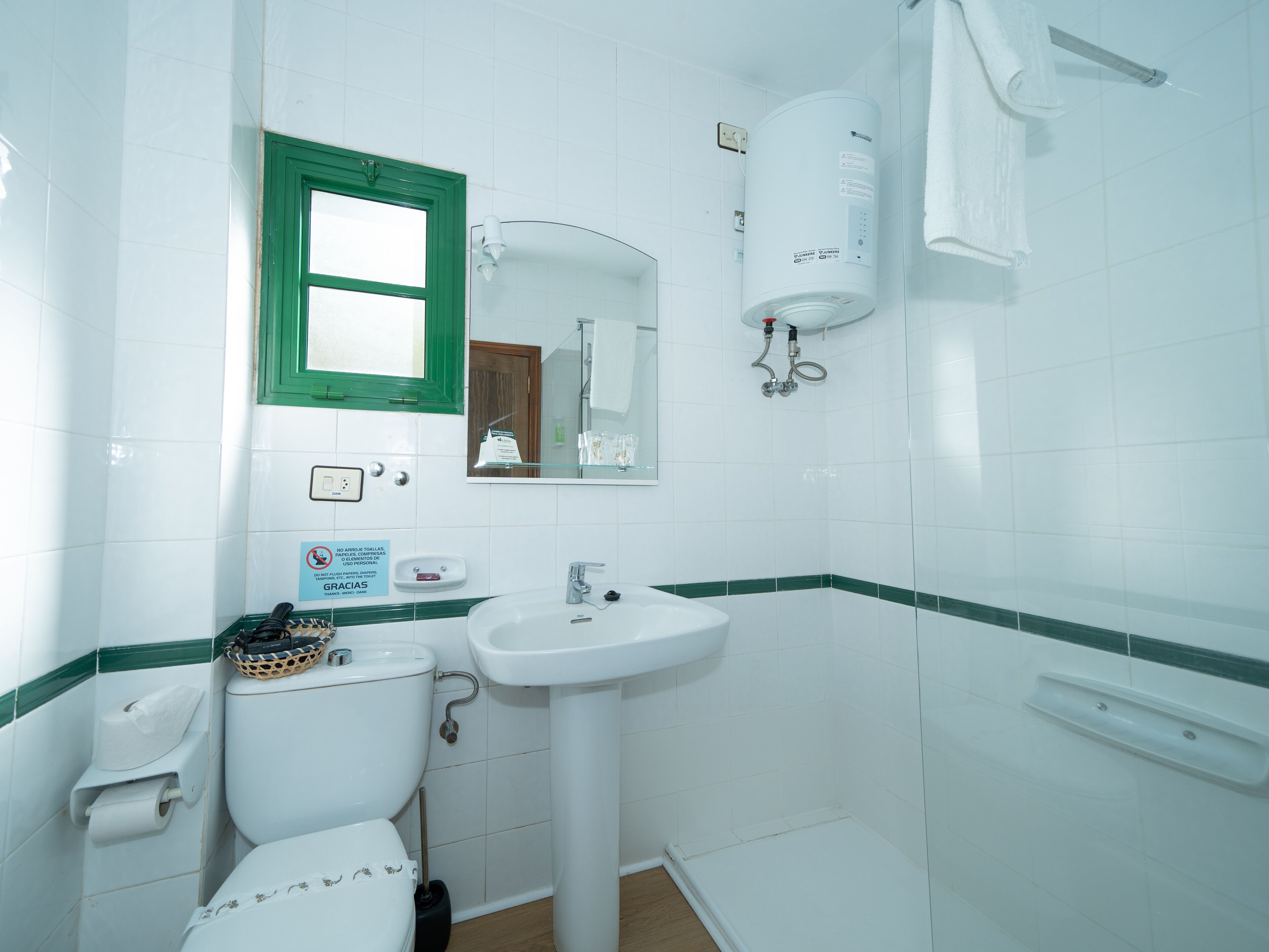 bathtub, free toiletries, hair dryer, slippers