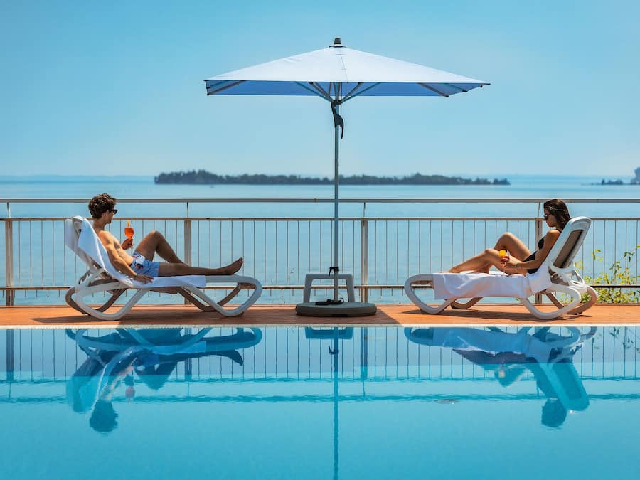 Seasonal outdoor pool, pool umbrellas, sun loungers