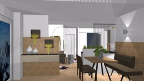 A modern interior with a wooden reception desk, two vases, and potted plants. There is a dining area with a table and chairs. - Appartements Bergsonne (Westendorf)