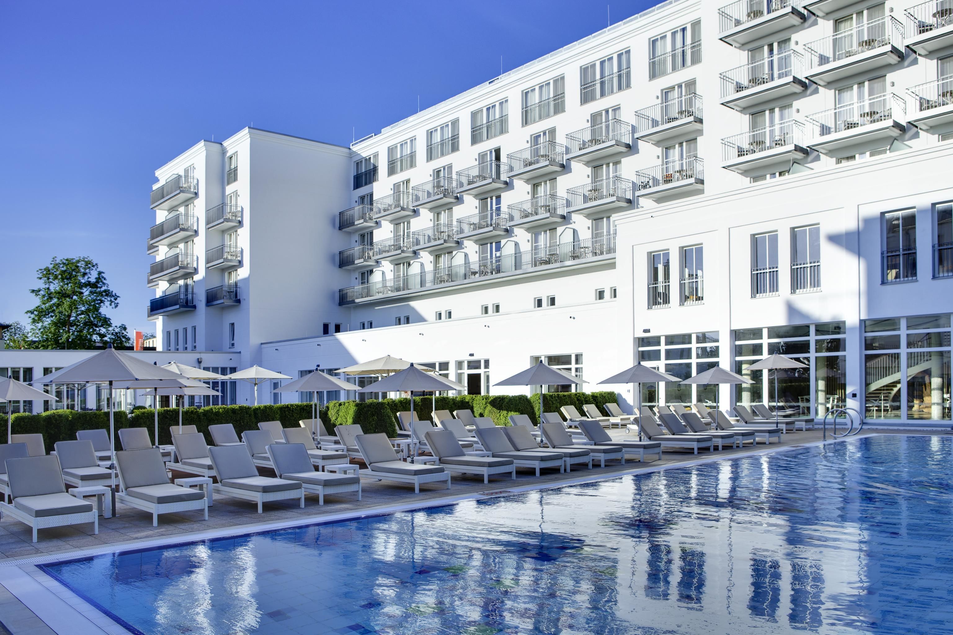 Indoor pool, outdoor pool, pool umbrellas, sun loungers