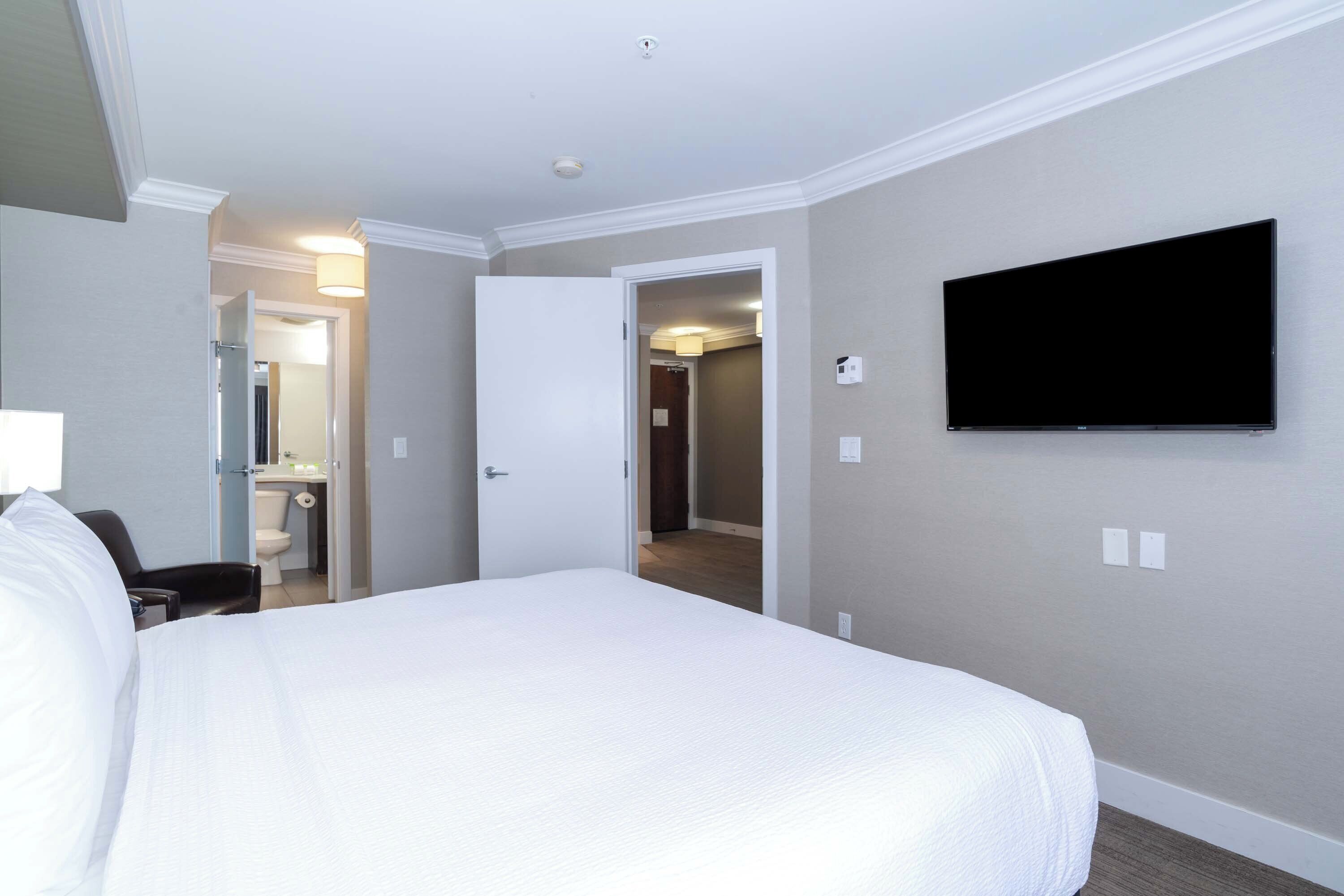 standard suite, 1 king bed, kitchenette | pillow-top beds, desk, blackout curtains, iron/ironing board