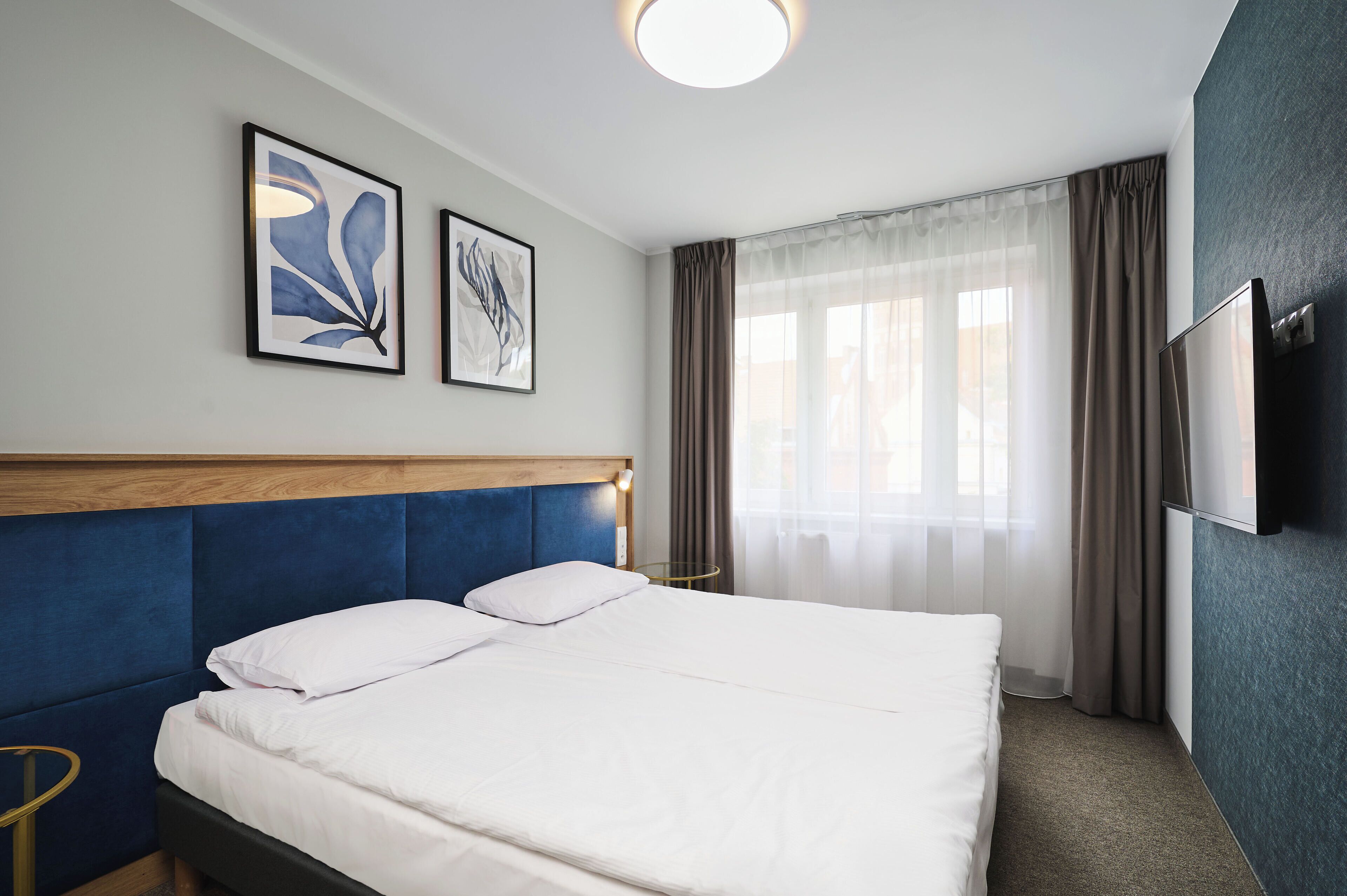 hypo-allergenic bedding, desk, laptop workspace, free wifi