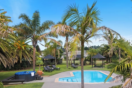 Outdoor pool, open 9:00 AM to 10:00 PM, sun loungers