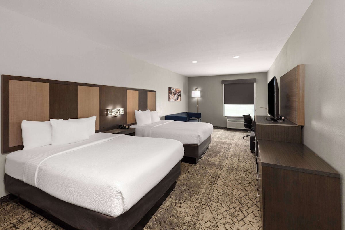 Executive Suite, 2 Queen Beds, Non Smoking | Premium bedding, pillow-top beds, desk, blackout curtains