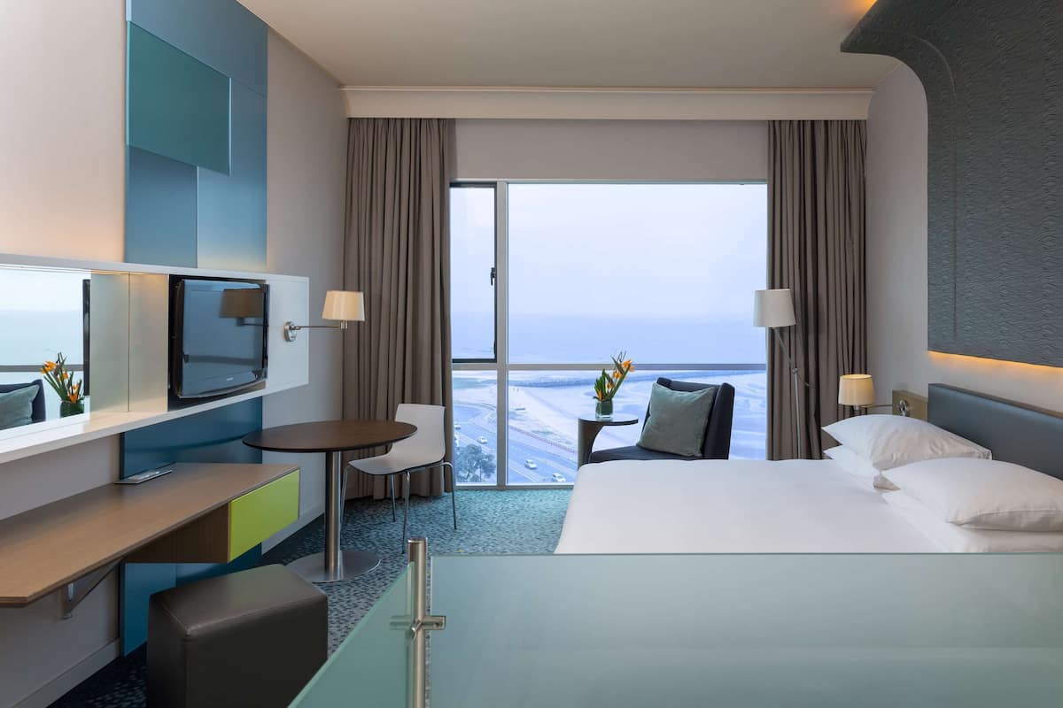 Premium Room, Sea View | Minibar, in-room safe, desk, laptop workspace
