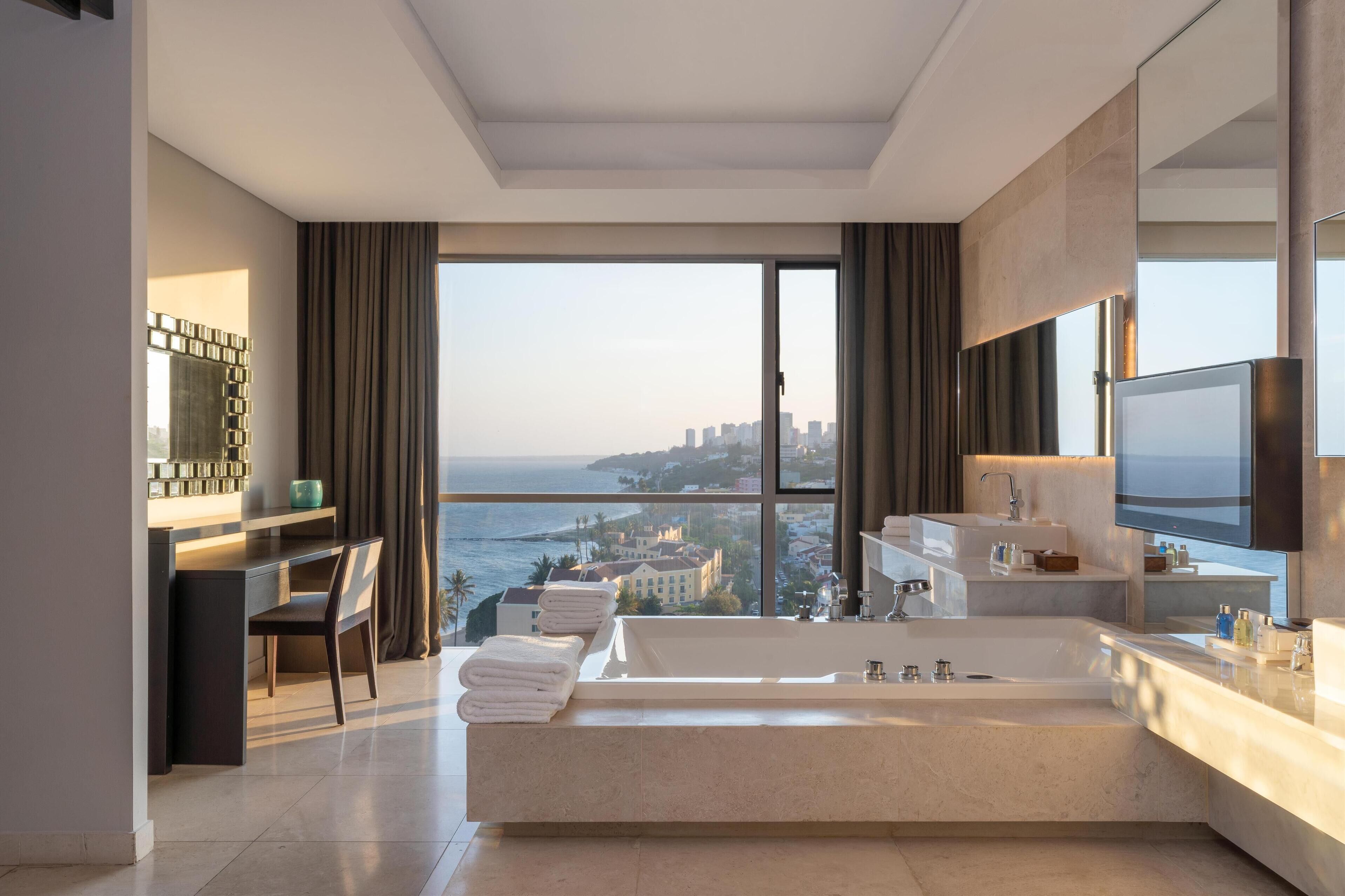 hair dryer, bathrobes, slippers, towels