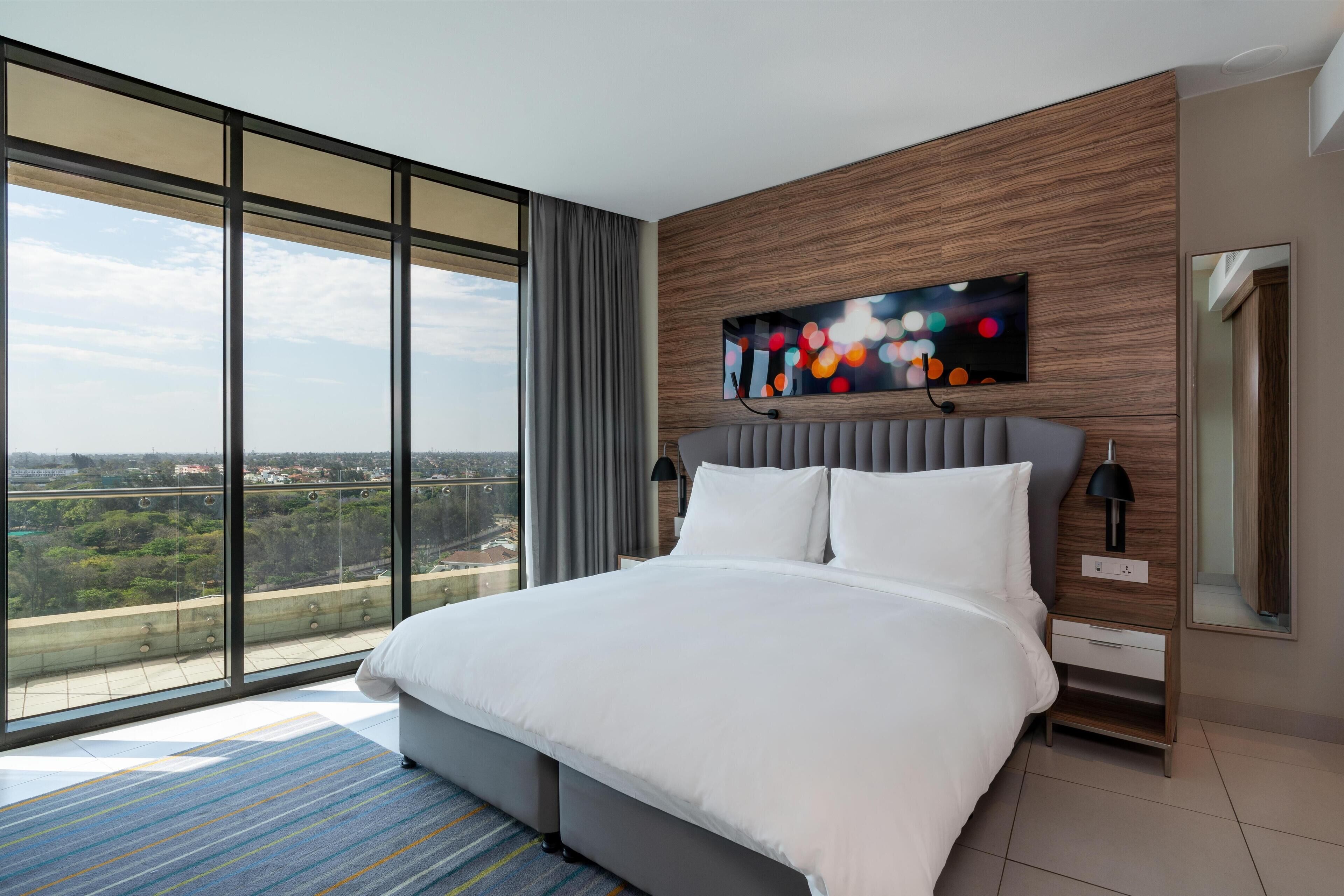 Apartment, 1 Bedroom, Balcony, City View | Minibar, in-room safe, desk, laptop workspace