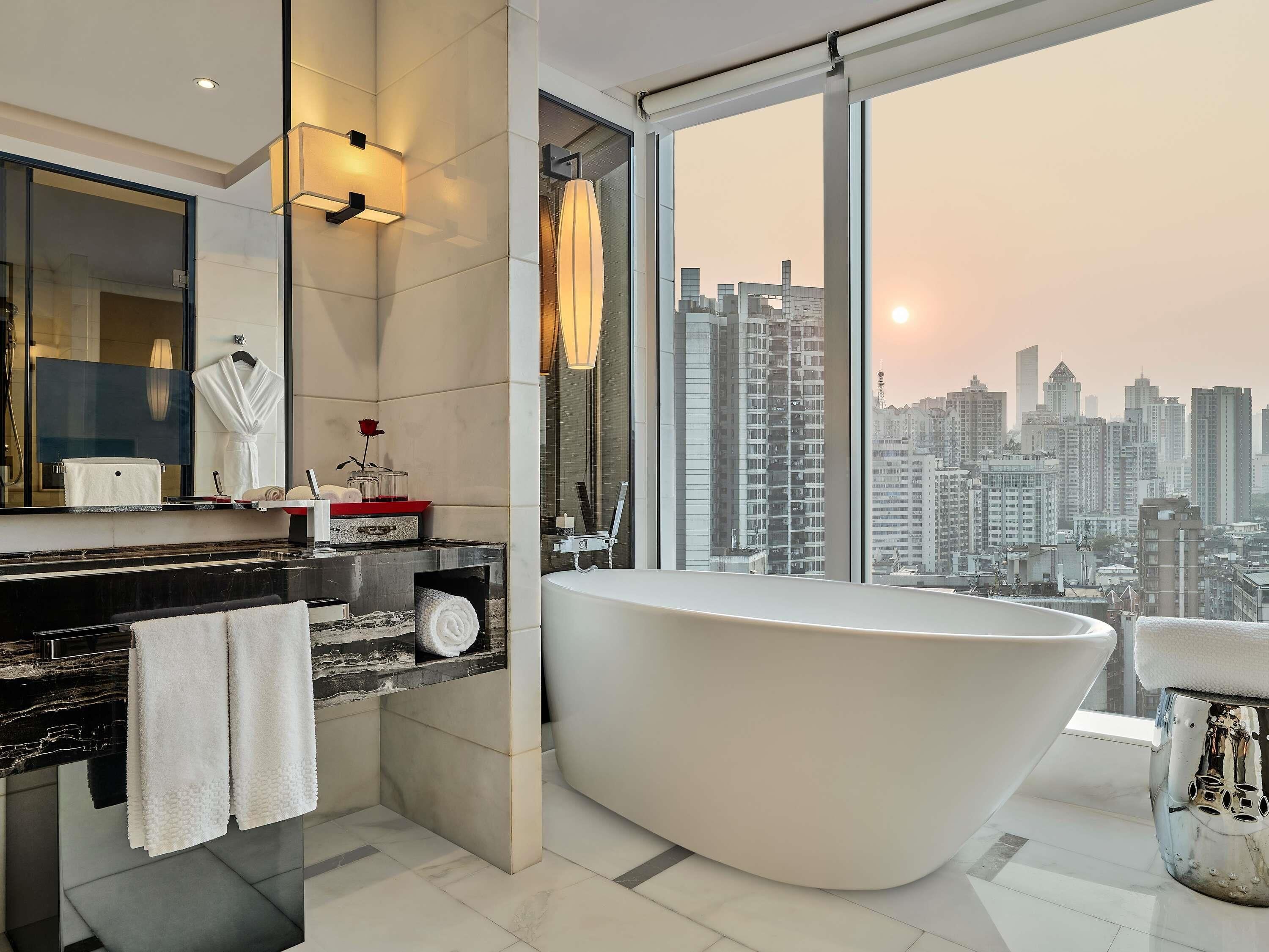 Separate tub and shower, deep soaking tub, rainfall showerhead