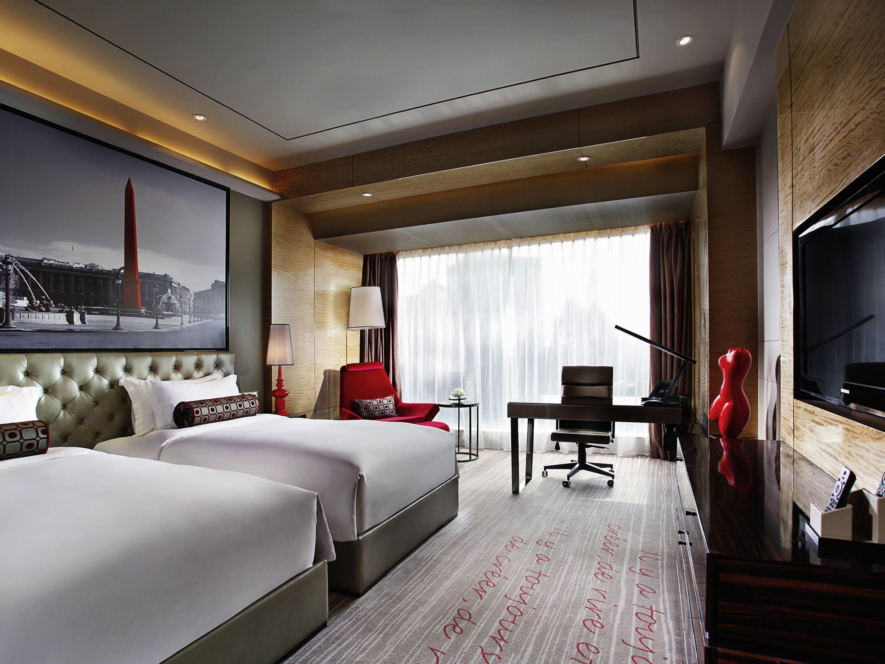 1 habitación, ropa de cama de alta calidad, cubrecamas y minibar 