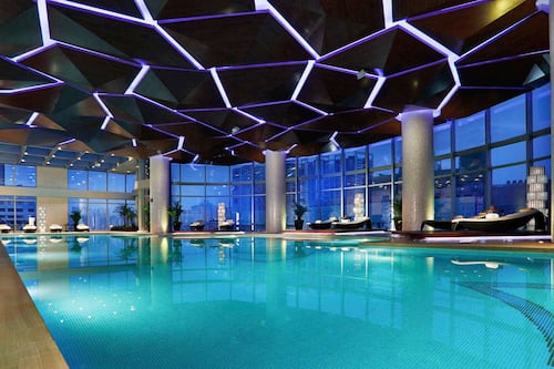 Indoor pool, open 6:00 AM to 10:00 PM, lifeguards on site