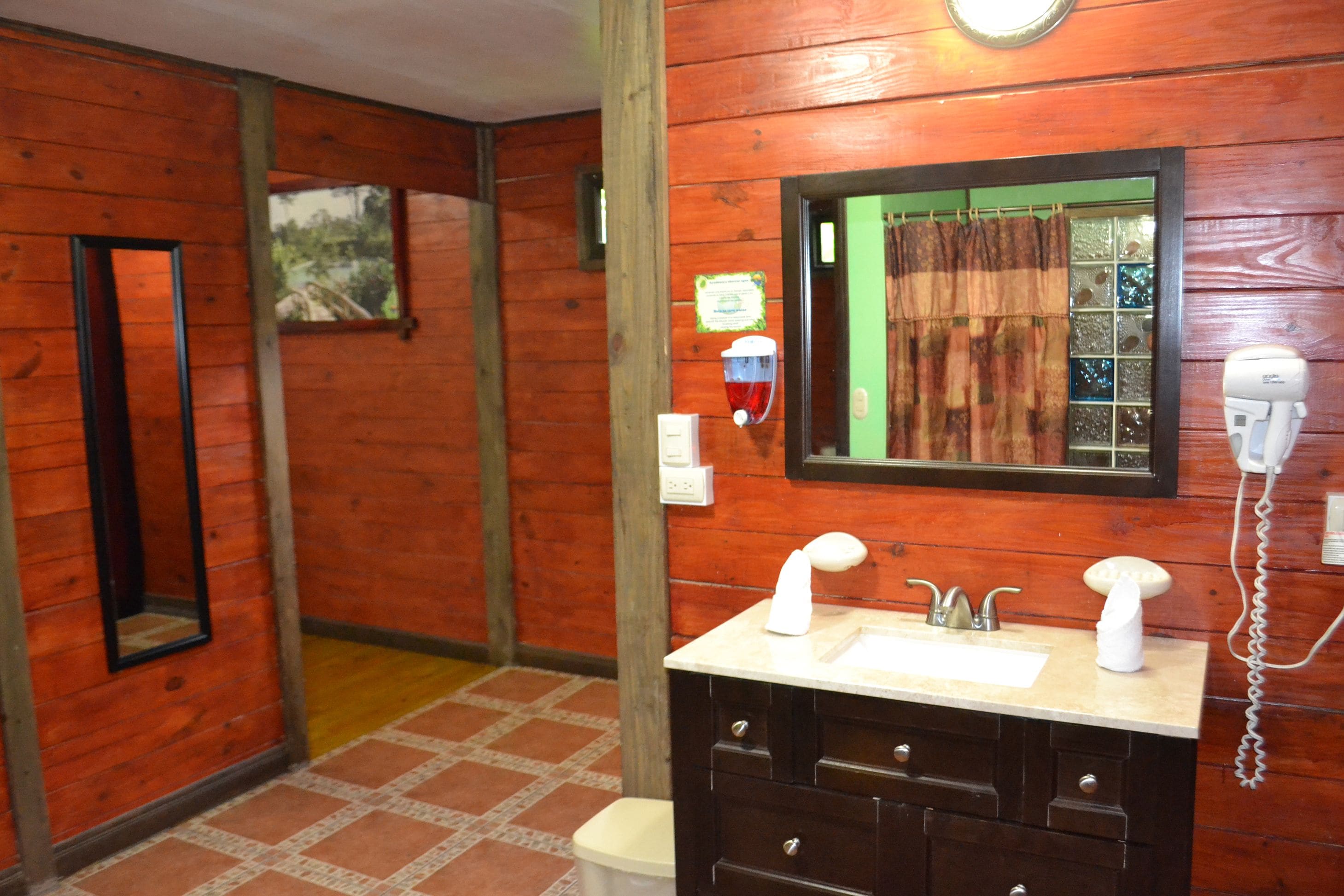 deluxe cabin, 2 queen beds | bathroom | shower, eco-friendly toiletries, hair dryer, bathrobes