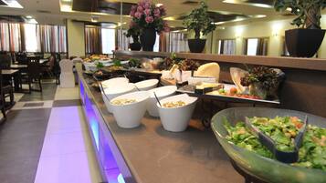 Daily buffet breakfast (USD 23 per person)