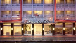 A hotel with a modern facade, multiple balconies, and a prominent entrance. - Hotel St Ellis (Legazpi)