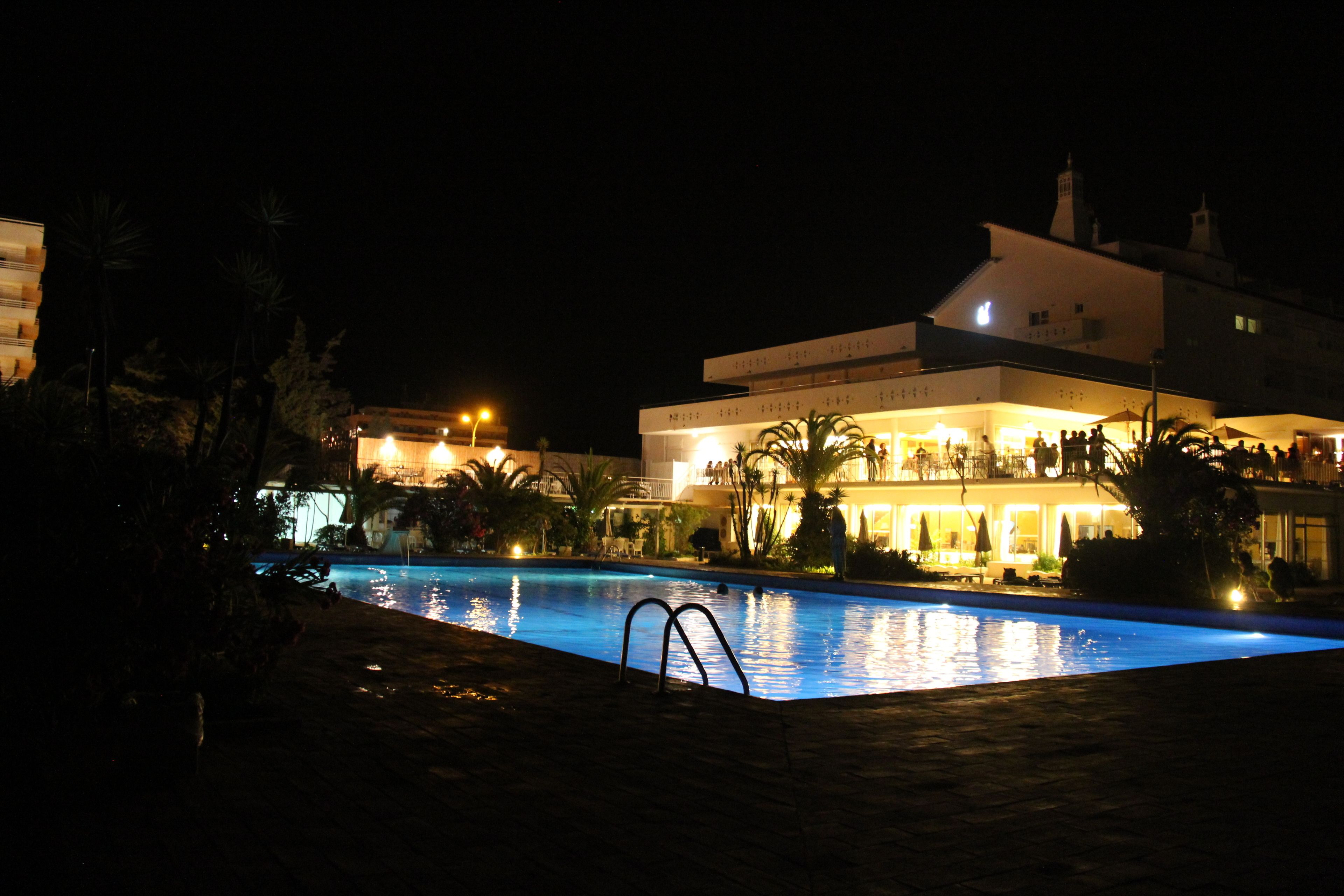 outdoor pool, pool umbrellas, pool loungers